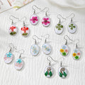Silver Tone Oval Pressed Flower Drop Earrings in Seven Designs view 1