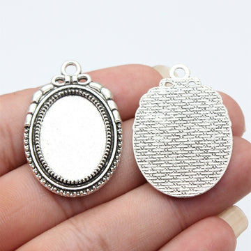 Oval 18 x 25 mm Cabochon Pendant Settings in Two Finishes