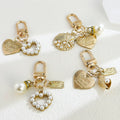 Gold Tone Seashell Starfish Charm Keychain With Faux Pearl view 1