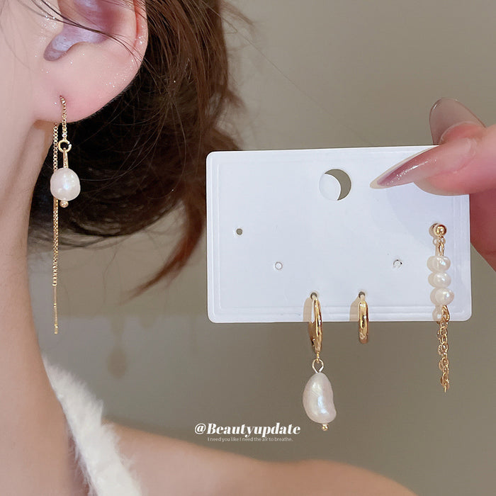 Gold Pearl Stud and Hoop Earring Four Piece Set with Polished Metal Details