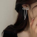 White Bow Pearl Chain Drop Earrings with Polished Metal Accents view 4