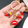 Red Chili Lips and Sombrero Metal Keychain Charm Set view 1