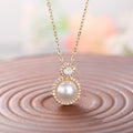 Gold Tone Faux Pearl Halo Pendant Necklace Clear CZ Accents view 3