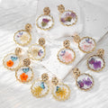 Gold Tone Scalloped Round Pressed Flower Resin Stud Earrings view 1