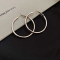 Slim Polished Metal Hoop Earrings in Three Size and Color Options view 7