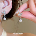 Butterfly and Pearl Drop Stud Earrings in Gold and Silver view 3