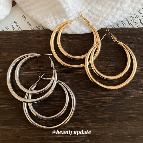 Three nested smooth hoops forming a bold rounded profile in a close product view.
