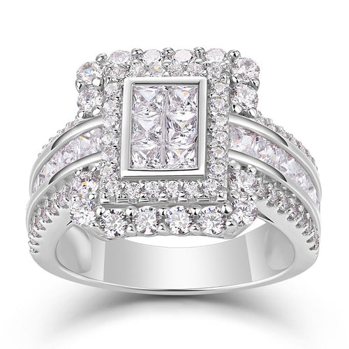 Front face of silver multi-princess halo ring with channel shoulders