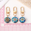 Gold and Silver Tone Blue Crystal Evil Eye Clip Keychains view 4