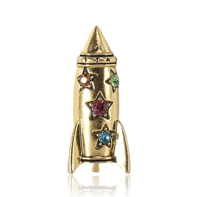 A narrow rocket decorated with colorful stars shown on a white background
