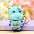 Smiling Cow Keychain with Beige Enamel and Crystal Flower Accent view 2