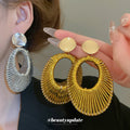 Woven Open Oval Drop Stud Earrings in Gold and Silver view 2