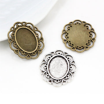 Open Scroll Floral Oval Pendant Settings in Two Finishes