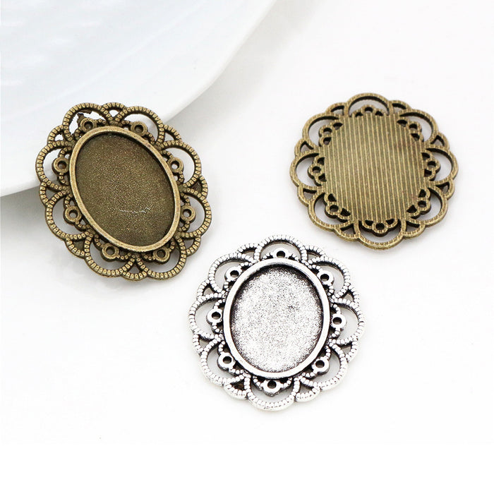 Open Scroll Floral Oval Pendant Settings in Two Finishes