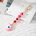 Evil Eye Bead Strand and Round Pendant Clip Keychains in Five Colors view 7