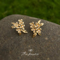 Gold Tone Clear Stone Osmanthus Flower Earrings In Clip And Stud Styles view 3
