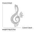 Crystal Treble Clef Brooch With Polished Metal And Sculpted Decorative Details view 5