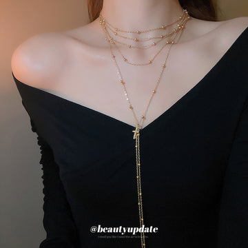 Layered Snake And Cross Pendant Necklace In Two Tones