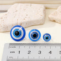 Round Blue Evil Eye Resin Stud Earrings in Three Sizes view 2