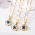 Gold Tone Crystal Halo Realistic Evil Eye Pendant Necklaces view 1