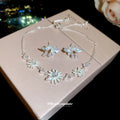 Enamel Flower Bracelet and Butterfly Pearl Stud Earrings view 1