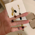 Asymmetric Black and Amber Beaded Gold Tone Drop Earrings view 3