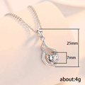 Silver Tone Swirl Pendant Necklace With Clear Round Stone view 5