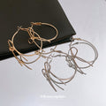 Open Bow Wire Hoop Earrings in Gold and Silver Tone view 2