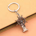 Metal Ship Wheel Keychain With Anchor Detail In Two Finishes view 3