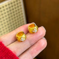 Gold Tone Textured Crystal Huggie Hoop Fashion Earrings view 1