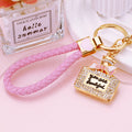 Jeweled Rectangular Perfume Bottle Keychains in Pink and Purple view 2