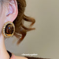 Amber Brown Oval Resin Stud Earrings with Crystal Borders view 3