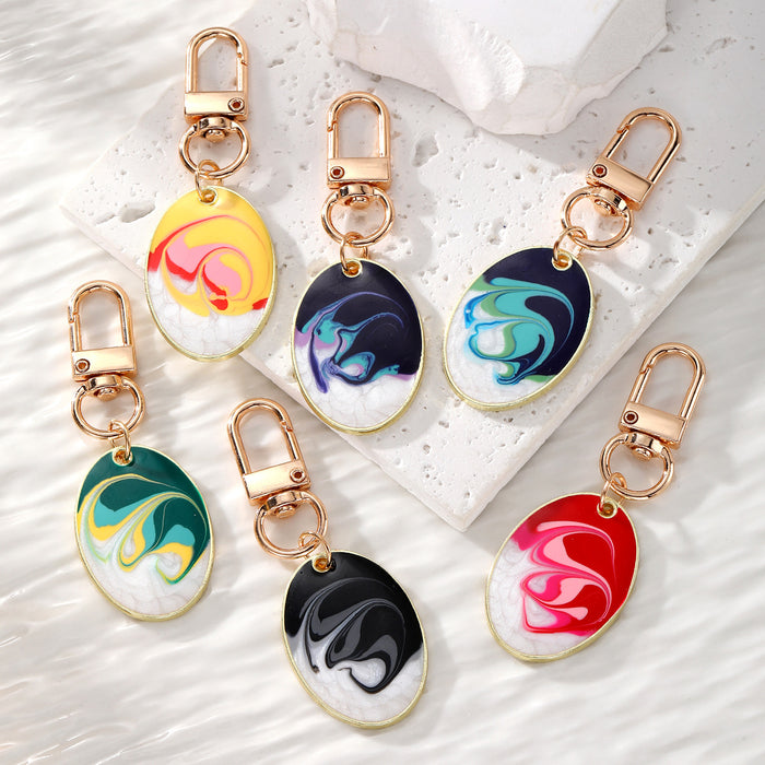 Gold Tone Oval Marbled Swirl Enamel Clip Keychains in Six Colors
