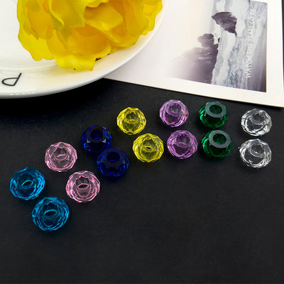 Clear flower beads arranged on a light background