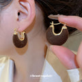Gold Tone Flocked Disc Hoop Earrings in Black Red and Brown view 4
