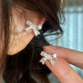 Silver Tone Crystal Bow Ear Cuffs For Left And Right Ears view 1