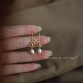 Gold Tone Bird Arch And White Pearl Drop Hook Earrings view 4