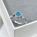 Blue Round Crystal Twist Band Ring in Silver Tone Polished Metal Jewelry view 2