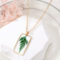 Gold Tone Rectangular Resin Pressed Flower Pendant Necklaces in Seven Designs view 6