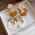 Resin Ring Flower Stud Earrings in Polished Statement Design view 3