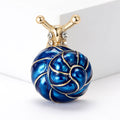 Round Spiral Shell Enamel Snail Brooch in Blue and Orange view 2