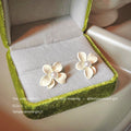 Ivory Five Petal Flower And White Pearl Center Stud Earrings view 4