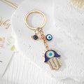 Blue Evil Eye Hamsa Hand Metal Keychains in Four Designs view 6