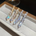 Crystal Heart Linear Drop Stud Earrings in Two Finishes view 1