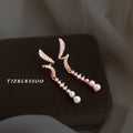 Rose Gold Tone Clear Stone Curved Ribbon And Pearl Long Earrings view 3