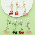 Butterfly Charm Keychains Featuring Black Cherry Across 31 Pictured Variations view 4