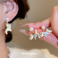 Cream Dog and Pearl Drop Stud Earrings with Detailed Finish view 2