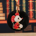 Jeweled Ball Holding Mouse Keychains with Braided Loops and Six Faux Fur Pom Colors view 11