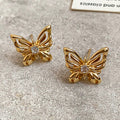 Sculpted Openwork Butterfly Stud Earrings in Gold Tone view 3