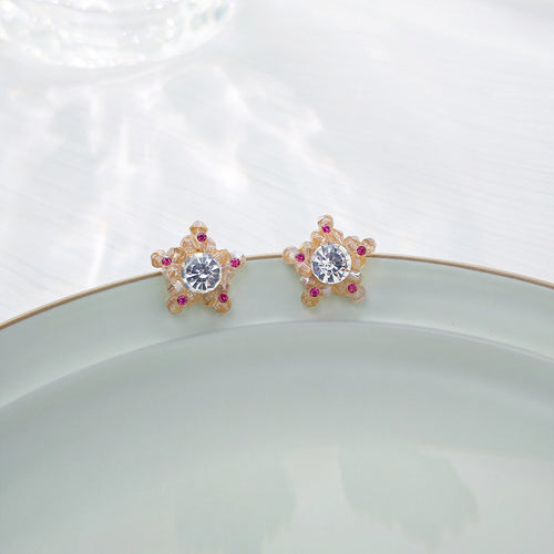 Second supplied view of colorful star outline stud earrings